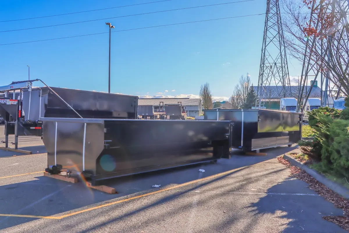Roll-off dumpster ready for waste disposal at job site for 2 Yard Dumpster Rental in Carol Stream